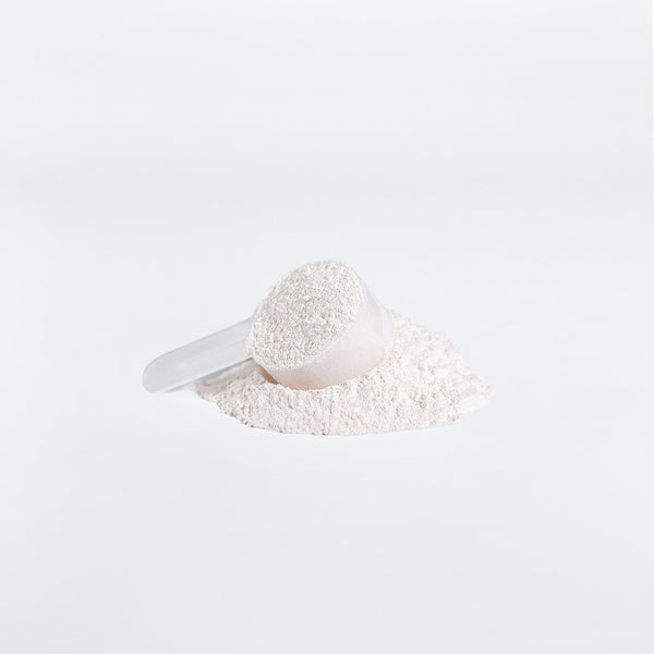 Scoop of honeydew watermelon BCAA supplement powder by Revita Genix Labs on white background
