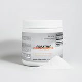 Revita Genix Labs pure creatine monohydrate supplement container with white powder pile