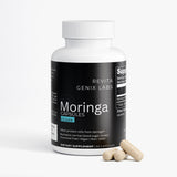 Revita Genix Labs pure moringa capsules bottle with three beige capsules on white background