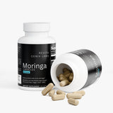 Revita Genix  Labs pure moringa capsules bottle with capsules spilled on white background