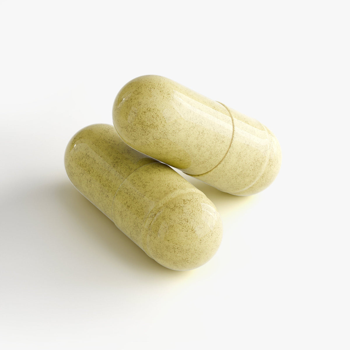 Two yellow capsules of premium NAD Resveratrol supplements by Revita Genix Labs on white background