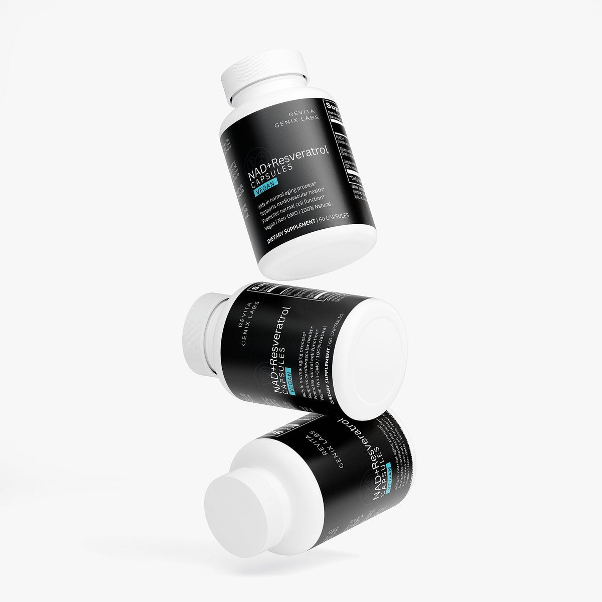 Three bottles of Revita Genix Labs premium NAD Resveratrol supplements with black labels and white caps