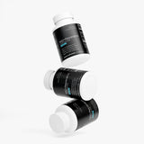 Three bottles of Revita Genix Labs premium NAD Resveratrol supplements with black labels and white caps